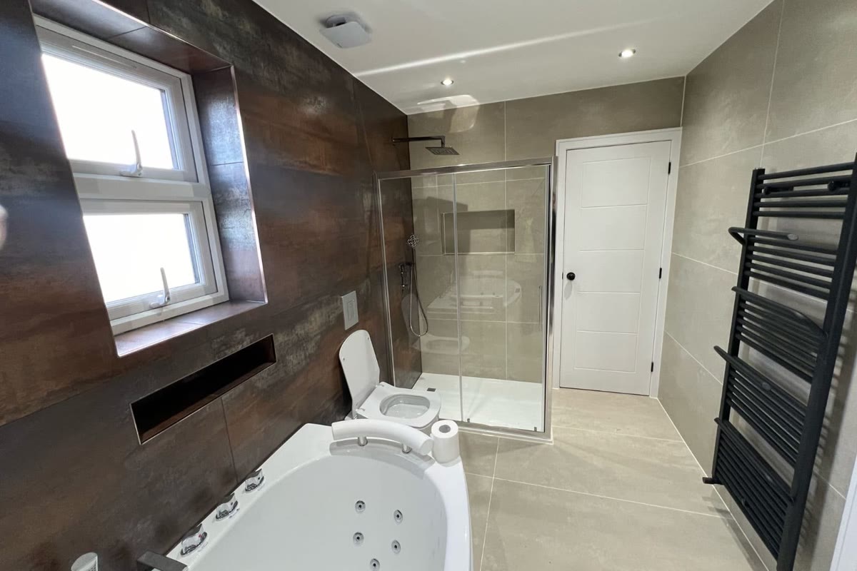 Bathrooms by All In One Builders, photograph 1