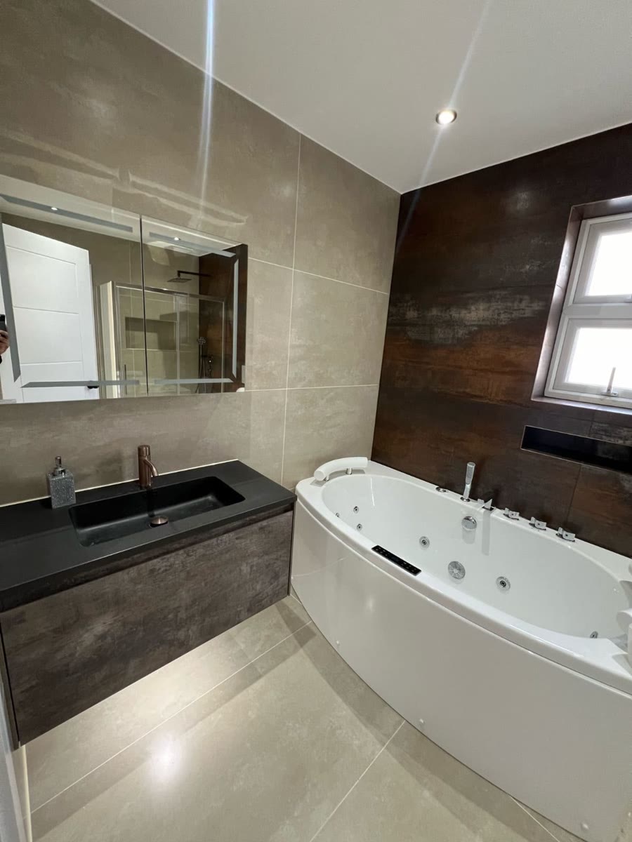 Bathrooms by All In One Builders, photograph 3